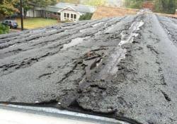 old roofing system in Springfield, VA, that need replacement.