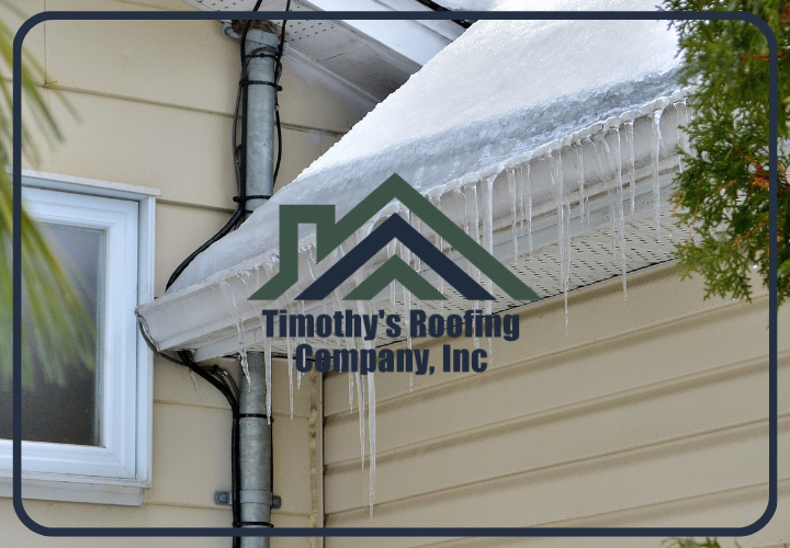 Close-up of an ice dam forming at the edge of a snowy roof in Lorton.