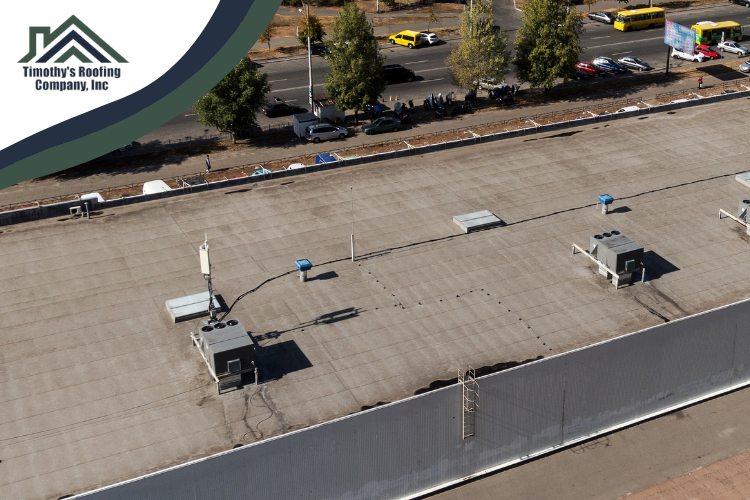 Visible signs of wear and tear on a commercial roof, indicating the need for Fairfax replacement services.